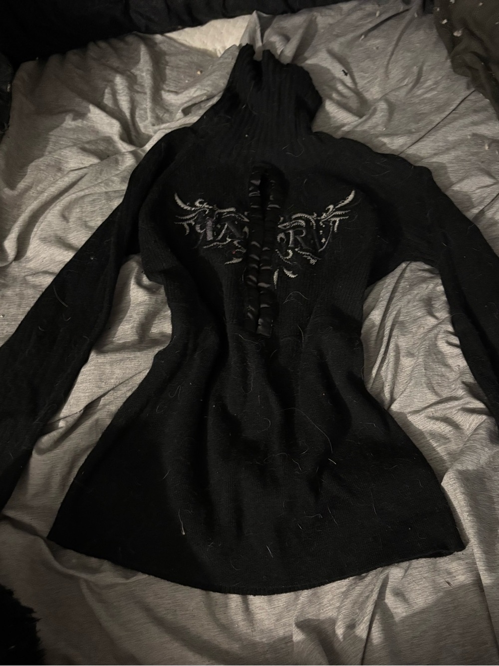 Käro Ribbed Black Sweater with Satin Trim